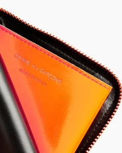 Super Fluo Half Zip Wallet in Pink/Yellow